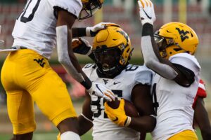 HOW THEY SCORED: Texas Tech 34, West Virginia 27